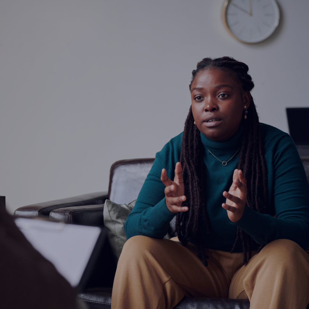 woman with her hands open in conversation