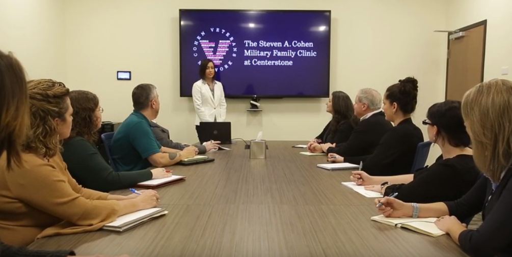 Clinic Staff Meeting in Conference Room